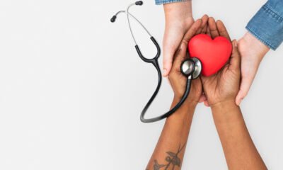 hand cupping stethoscope health concept